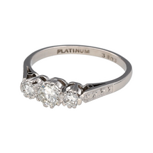 Load image into Gallery viewer, Bring timeless meaning and elegant sparkle to your collection with this pre-owned platinum diamond set trilogy ring, symbolising the past, present, and future in a refined and enduring design—perfect for sentimental gifting or classic everyday wear.

Design: The ring features three brilliant-cut diamonds totalling approximately 0.37 carats, with a slightly larger centre stone flanked by two smaller side stones in a traditional trilogy arrangement for balanced brilliance and symbolic depth.

