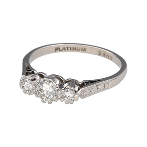 Bring timeless meaning and elegant sparkle to your collection with this pre-owned platinum diamond set trilogy ring, symbolising the past, present, and future in a refined and enduring design—perfect for sentimental gifting or classic everyday wear.

Design: The ring features three brilliant-cut diamonds totalling approximately 0.37 carats, with a slightly larger centre stone flanked by two smaller side stones in a traditional trilogy arrangement for balanced brilliance and symbolic depth.
