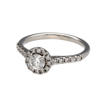 Load image into Gallery viewer, Bring timeless sparkle and elegant sophistication to your collection with this pre-owned 18ct white gold diamond set halo cluster ring, featuring classic brilliance in a graceful design—perfect for engagements, anniversaries, or everyday luxury.

Design: The ring showcases a 0.25ct brilliant-cut centre diamond surrounded by a delicate halo of diamonds, with additional stones set along the shoulders. 
