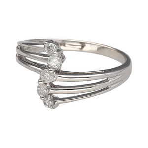 Bring contemporary elegance and graceful sparkle to your collection with this pre-owned 18ct white gold diamond set split band ring, featuring a flowing design with brilliant detail—perfect for standout style or meaningful gifting.

Design: The ring showcases a gently curved front with five brilliant-cut diamonds arranged in a sweeping line across a split band, totalling approximately 0.25 carats, offering a modern twist on a classic five-stone setting.
