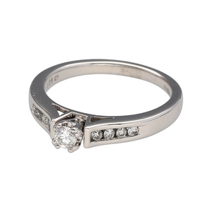 Bring classic sophistication and timeless sparkle to your collection with this pre-owned 18ct white gold diamond set solitaire ring, featuring a refined design with elegant detail—perfect for engagements or meaningful celebrations.

Design: The ring showcases a central brilliant-cut diamond of approximately 0.25ct, complemented by additional diamonds set along the shoulders for added sparkle and graceful symmetry.
