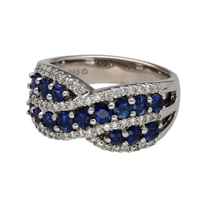 Showcase bold design and timeless elegance with this pre-owned 14ct white gold diamond and sapphire crossover band ring—a striking statement piece with rich colour and refined sparkle.

Design: This sculptural ring features an eye-catching crossover design set with alternating diamonds and sapphires. The front of the band measures 7mm wide at the centre and expands to 10mm wide at the sides, creating a dynamic and contemporary profile.

