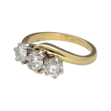 Load image into Gallery viewer, Bring graceful sparkle and symbolic elegance to your collection with this pre-owned 18ct yellow gold twist trilogy ring, featuring three brilliant diamonds in a flowing design—perfect for marking meaningful moments or adding timeless sophistication.

Design: The ring features a twist-style setting with three brilliant-cut diamonds, symbolising past, present, and future. The elegant curve of the design adds fluidity and movement to the classic trilogy arrangement.

