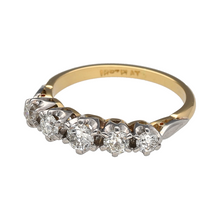 Load image into Gallery viewer, Bring classic sparkle and refined elegance to your collection with this pre-owned 18ct yellow gold five stone band ring, featuring brilliant diamonds in a timeless design—perfect for marking special occasions or everyday luxury.

Design: The ring features five brilliant-cut diamonds set in a row across the band, offering a balanced and elegant display. With a total diamond content of approximately 0.50ct and an estimated clarity of SI1, the stones provide eye-catching sparkle and lasting brilliance.

