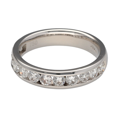 Bring radiant sparkle and modern elegance to your collection with this pre-owned 18ct white gold and diamond band ring—a refined piece with timeless brilliance.

Design: This sleek 4mm wide band is set with twelve brilliant-cut diamonds, evenly spaced for a continuous shimmer across the finger.
Material: Made from 18-carat white gold, the polished finish enhances the brightness and clarity of the stones.
Ring Detail: With an approximate total diamond content of 1.00ct, the ring delivers substantial sparkle.