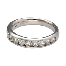 Load image into Gallery viewer, Bring bold brilliance and contemporary elegance to your collection with this pre-owned 18ct white gold and diamond set band ring—a luxurious piece with timeless sparkle.

Design: This striking ring features a 5mm wide front set with an array of brilliant-cut diamonds, creating a seamless band of radiance across the finger.
Material: Made from 18-carat white gold, the highly polished finish enhances the brightness and clarity of the diamonds for a clean, modern look.

