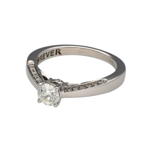Load image into Gallery viewer, Bring refined sparkle and timeless simplicity to your jewellery collection with this pre-owned 18ct white gold solitaire ring, featuring a brilliant-cut diamond and elegant shoulder detail—perfect for marking special moments or elevating everyday wear.

Design: This classic solitaire design highlights a brilliant-cut diamond of approximately 0.40ct, enhanced by smaller diamonds along the shoulders for added shimmer and graceful symmetry.

