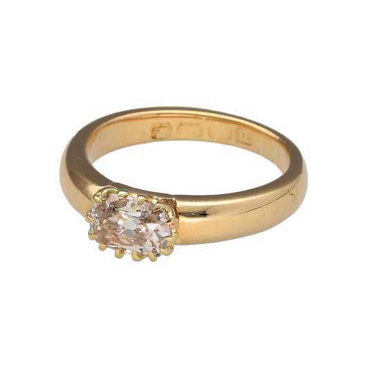 Celebrate classic elegance with this pre-owned 18ct yellow gold oval cut diamond solitaire ring, a refined piece that showcases timeless sparkle and sophistication.

Design: The ring features an oval cut diamond of approximately 0.61ct–0.76ct, offering brilliance and graceful proportions in a traditional solitaire style.
Material: Made in 18-carat yellow gold, the polished finish provides a warm contrast that enhances the diamond’s fire and radiance.