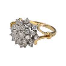 Load image into Gallery viewer, Bring vintage charm and brilliance to your collection with this pre-owned 18ct yellow gold diamond cluster ring, designed with ornate detail and timeless sparkle.

Design: The ring features a 14mm high diamond cluster at the front, enhanced by elegant split shoulders with scroll detailing for added character.
Material: Made in 18-carat yellow gold, the polished finish provides a warm backdrop that enhances the radiance of the diamonds.
