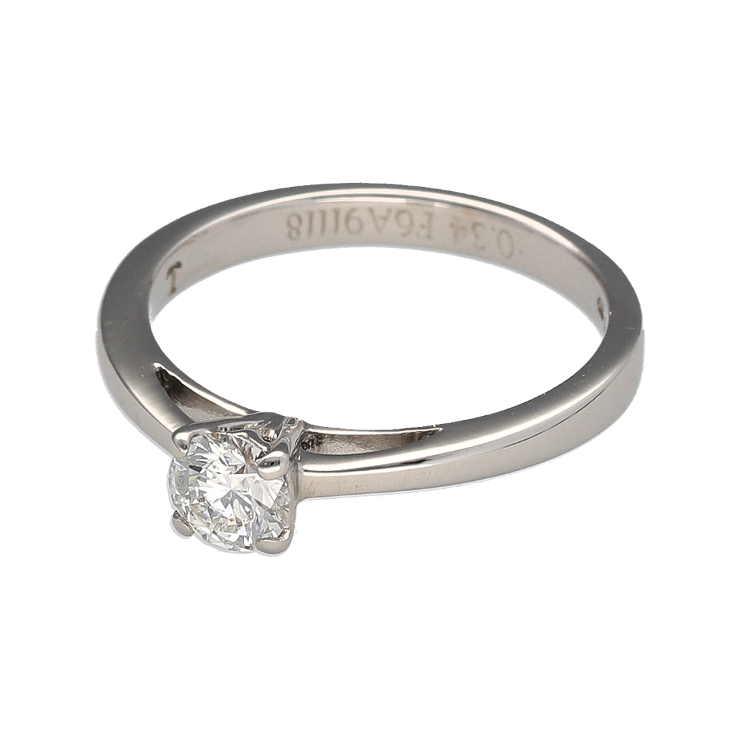 Bring timeless elegance and refined sparkle to your collection with this pre-owned 18ct white gold diamond solitaire ring, a classic design perfect for life’s most special moments.

Design: The ring features a single brilliant-cut diamond of approximately 0.34ct, with an estimated clarity of Si1, creating a radiant and eye-catching centrepiece.
Material: Made from 18-carat white gold, the polished finish enhances the diamond’s brilliance and gives the ring a sleek, sophisticated appearance.