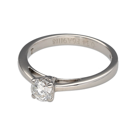 Bring timeless elegance and refined sparkle to your collection with this pre-owned 18ct white gold diamond solitaire ring, a classic design perfect for life’s most special moments.

Design: The ring features a single brilliant-cut diamond of approximately 0.34ct, with an estimated clarity of Si1, creating a radiant and eye-catching centrepiece.
Material: Made from 18-carat white gold, the polished finish enhances the diamond’s brilliance and gives the ring a sleek, sophisticated appearance.