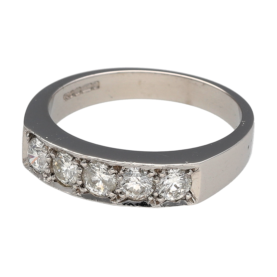 Bring radiant sparkle and timeless elegance to your collection with this pre-owned 18ct white gold diamond five stone band ring, a classic design with lasting appeal.

Design: The ring features a 5mm wide front, set with five brilliant-cut diamonds totalling approximately 0.75ct, creating a bold and balanced look.
Material: Made from 18-carat white gold, the polished finish enhances the brilliance of the diamonds and gives the ring a sleek, sophisticated appearance.
