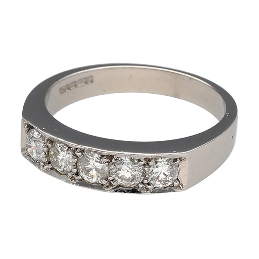 Bring radiant sparkle and timeless elegance to your collection with this pre-owned 18ct white gold diamond five stone band ring, a classic design with lasting appeal.

Design: The ring features a 5mm wide front, set with five brilliant-cut diamonds totalling approximately 0.75ct, creating a bold and balanced look.
Material: Made from 18-carat white gold, the polished finish enhances the brilliance of the diamonds and gives the ring a sleek, sophisticated appearance.