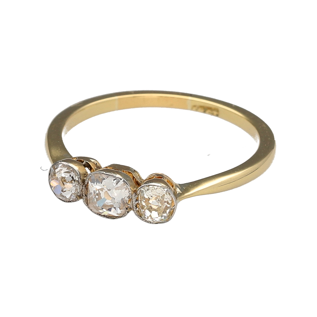 Bring timeless elegance and vintage charm to your jewellery collection with this pre-owned 18ct yellow gold diamond old cut trilogy ring, a classic design rich in meaning and character.

Design: The ring features a traditional trilogy arrangement of old cut diamonds, creating a beautifully balanced and elegant focal point with vintage appeal.
Material: Made from polished 18-carat yellow gold, the warm tone enhances the character of the old cut diamonds and complements the classic styling.