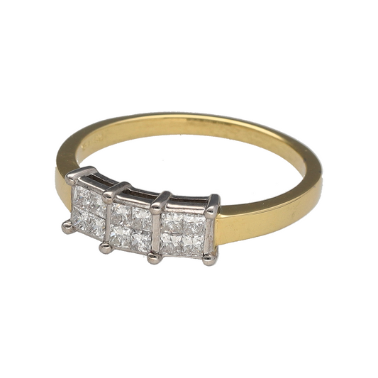 Bring refined sparkle and classic symbolism to your jewellery collection with this pre-owned 18ct yellow gold diamond illusion set princess cut trilogy ring, a timeless design with elegant presence.

Design: The ring features a trilogy arrangement made up of smaller princess-cut diamonds, illusion set to give the appearance of larger stones and create a bold, eye-catching focal point.