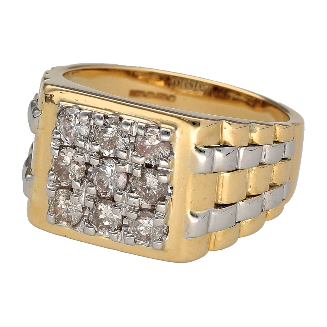 Make a bold and luxurious statement with this pre-owned 18ct yellow and white gold diamond signet ring, featuring watch-style shoulders and exceptional presence—ideal for those who appreciate standout design and fine detail.

Design: This signet ring features a substantial front measuring approximately 14mm in height, complemented by distinctive watch-style shoulders that add depth, structure, and a striking visual profile. Diamond detailing across the design provides impressive brilliance and impact.