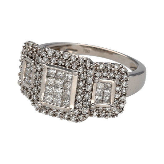 Add striking brilliance and contemporary elegance to your jewellery collection with this pre-owned 18ct white gold halo trilogy ring, offering exceptional sparkle and a bold, refined presence.

Design: This ring features a trilogy-style front measuring approximately 13mm in height, with a central arrangement framed by a halo of diamonds for maximum impact. The combination of brilliant cut and princess cut diamonds creates depth, contrast, and eye-catching sparkle.