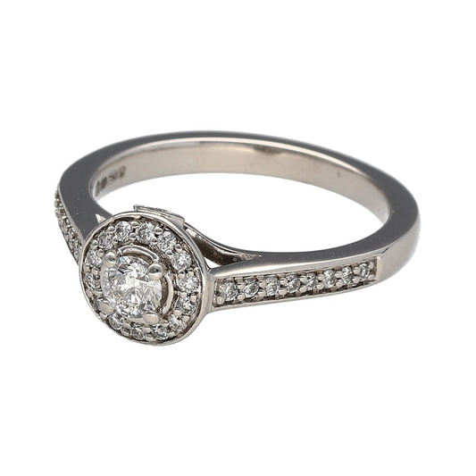 Elevate your jewellery collection with this pre-owned 18ct white gold diamond set halo ring by Jenny Packham, combining designer elegance with refined sparkle. A sophisticated piece perfect for special occasions or timeless everyday luxury.

Design: The front of the ring measures approximately 8mm high and features a classic halo setting, creating a beautifully defined focal point.