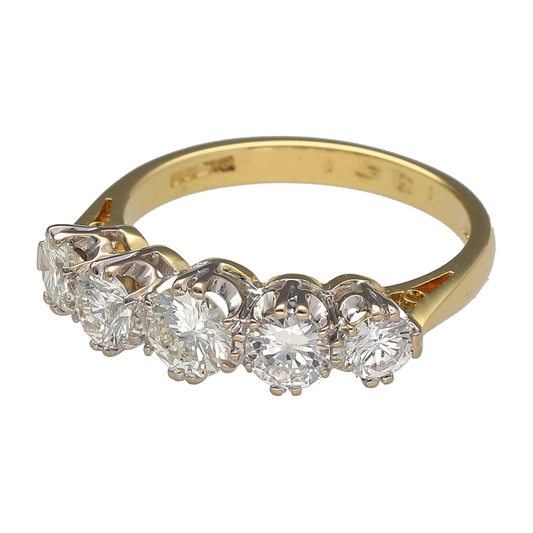 Indulge in timeless luxury with this pre-owned 18ct yellow gold diamond five stone ring, showcasing impressive brilliance across the band—an exceptional choice for an engagement ring, anniversary gift or statement diamond piece.

Design: The ring features five beautifully matched diamonds arranged in a classic graduated five stone style, creating a striking display of sparkle across the finger.