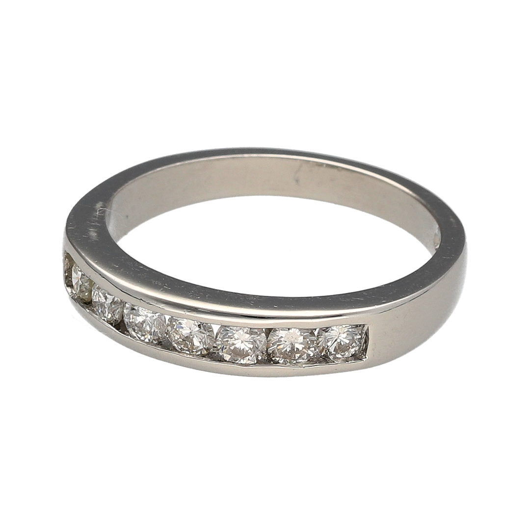 Add a refined and elegant piece to your jewellery collection with this pre-owned platinum diamond set band ring, combining timeless design with beautiful sparkle—perfect for everyday wear or special occasions.

Design: The ring features a classic band design, set with diamonds across the front for a clean and sophisticated look.
Material: Made from platinum, it has a naturally bright and durable finish that enhances the brilliance of the diamonds.