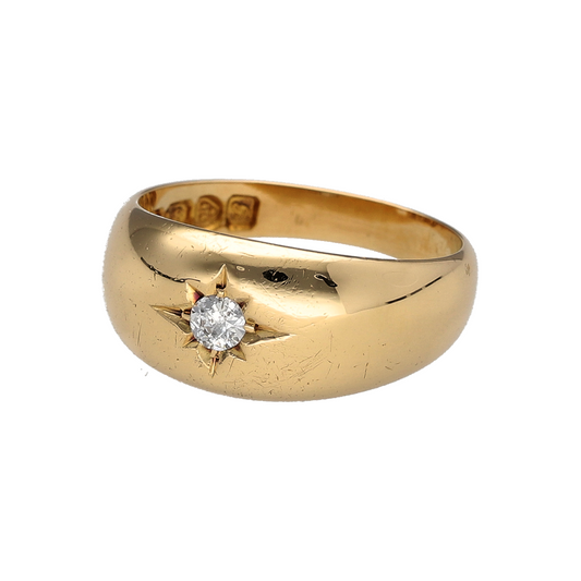 Add bold vintage-inspired style to your jewellery collection with this pre-owned 18ct yellow gold diamond starburst solitaire band ring, featuring a wide design with striking detail—perfect for statement wear or everyday luxury.

Design: The ring features a single diamond of approximately 0.10ct, presented in a starburst setting that radiates outward for a distinctive and eye-catching look.