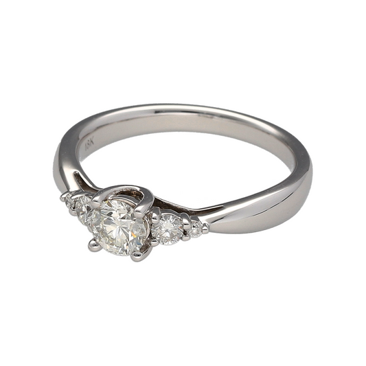 Add timeless brilliance and refined elegance to your collection with this pre-owned 18ct white gold diamond set solitaire-style ring—an eye-catching piece with classic appeal.

Design: The ring features a central brilliant-cut diamond of approximately 0.28ct, complemented by smaller diamonds on either side to create a five-stone arrangement. With approximately 0.37ct total diamond content, the design offers a beautifully balanced and sparkling finish.