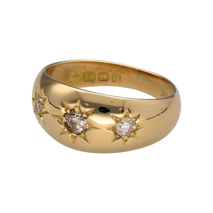 Bring vintage-inspired elegance and timeless sparkle to your collection with this pre-owned 18ct yellow gold diamond starburst trilogy band ring, featuring a bold design with distinctive character—perfect for special occasions or statement everyday wear.

Design: The ring features a wide trilogy-style band measuring approximately 9mm across the front, detailed with starburst-style diamond settings that create a striking vintage-inspired appearance.