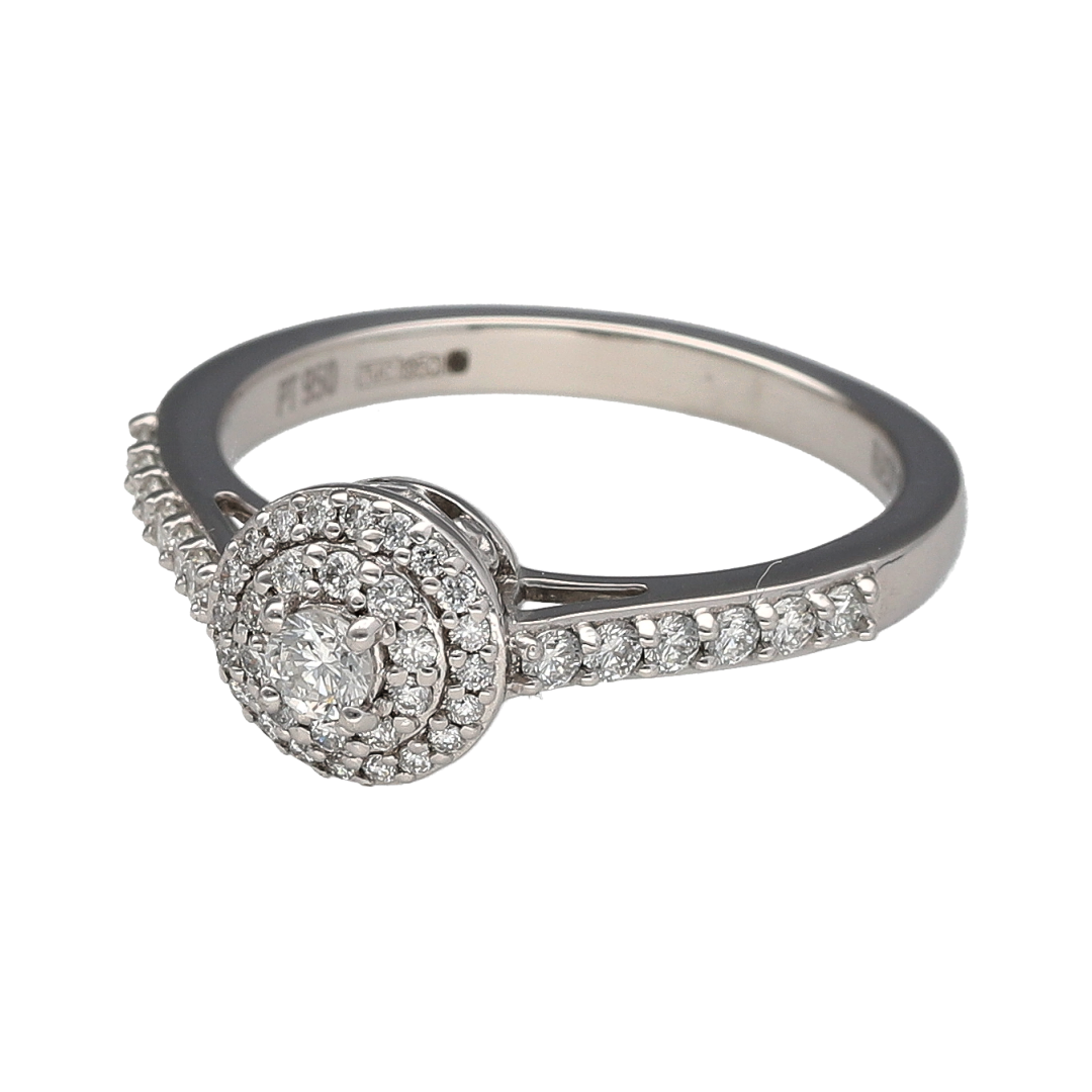 Add exceptional sparkle and timeless sophistication to your jewellery collection with this pre-owned platinum diamond halo ring, featuring an elegant multi-layered design with luxurious brilliance—perfect for special occasions, gifting, or refined everyday wear.

Design: The ring showcases a sparkling brilliant cut centre diamond surrounded by two concentric halos of diamonds, creating a stunning layered effect that maximises light and brilliance.