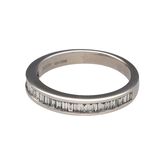 Add timeless elegance and sophisticated sparkle to your jewellery collection with this pre-owned 18ct white gold diamond band ring, featuring a refined baguette-cut diamond design with luxurious everyday appeal—perfect for anniversaries, special occasions, or elegant daily wear.

Design: The ring features a sleek band design measuring approximately 3mm wide at the front, set with a row of beautifully matched baguette-cut diamonds.