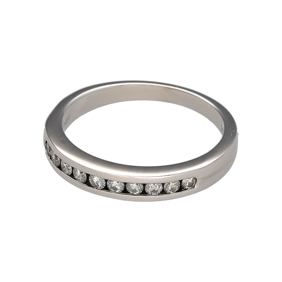 Add timeless sparkle and sophisticated elegance to your jewellery collection with this pre-owned 18ct white gold diamond band ring, featuring a classic channel-set design with refined everyday appeal—perfect for anniversaries, weddings, special occasions, or luxurious daily wear.

Design: The ring features a sleek band design measuring approximately 3mm wide at the front, set with a row of brilliant cut diamonds in a secure channel setting.