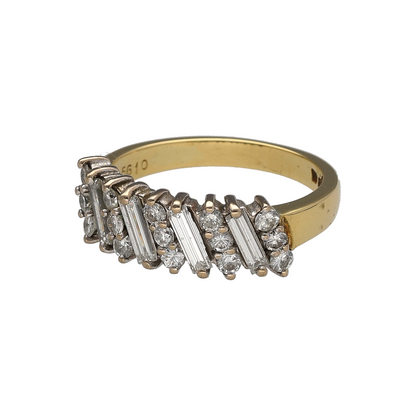 Add timeless sophistication to your jewellery collection with this pre-owned 18ct yellow gold diamond striped band ring. Featuring an elegant combination of baguette and brilliant-cut diamonds in a distinctive striped design, this beautiful ring offers refined sparkle and contemporary style.

Design: The ring showcases a 5mm wide band with diagonally arranged baguette-cut diamonds, complemented by three brilliant-cut diamonds positioned between them to create an eye-catching striped pattern.