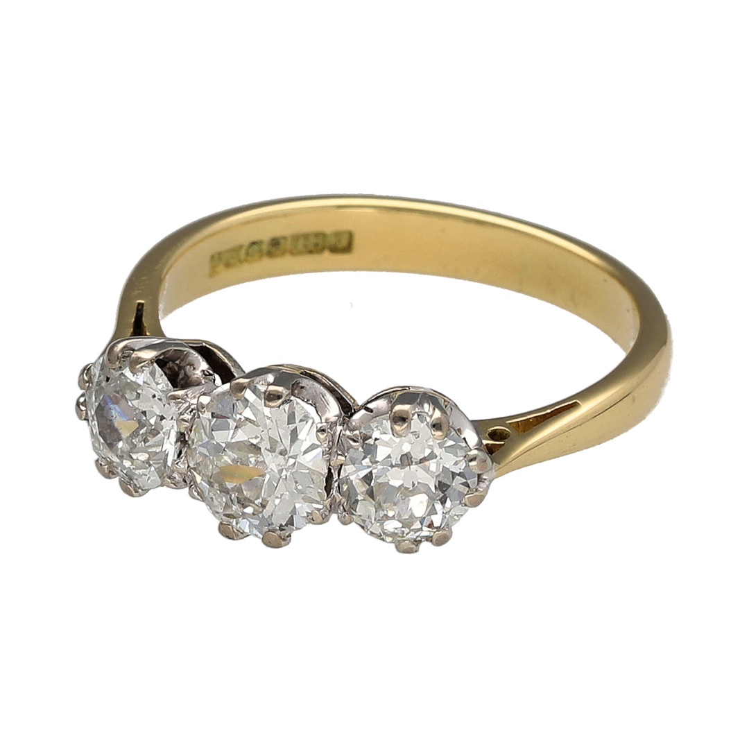 Make a lasting impression with this pre-owned 18ct yellow gold diamond trilogy ring, featuring an exceptional total diamond weight and timeless three-stone design. Combining remarkable brilliance with classic elegance, this stunning ring is perfect as an engagement ring, anniversary gift, or investment-quality addition to any fine jewellery collection.

Design: The ring showcases three dazzling diamonds arranged in the iconic trilogy setting
