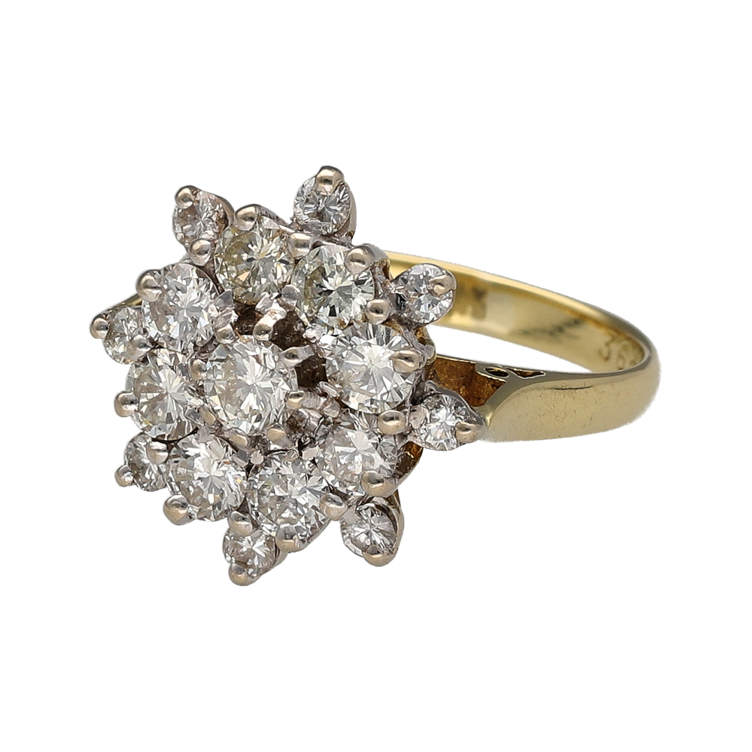 Make a statement with this pre-owned 18ct yellow gold diamond cluster ring, featuring an impressive diamond weight and exceptional sparkle. Designed to capture attention from every angle, this luxurious ring is perfect for special occasions, milestone celebrations, or as a standout addition to any fine jewellery collection.

Design: The ring showcases a striking diamond cluster arrangement with an impressive 15mm high front, creating a bold and glamorous appearance.