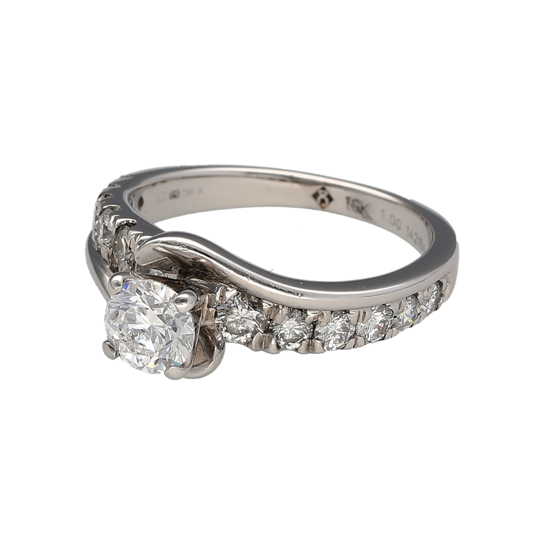Make a statement with this pre-owned 18ct white gold diamond twist solitaire ring, featuring an impressive total diamond weight and a beautifully flowing design. Combining a sparkling central diamond with diamond-set shoulders, this luxurious ring offers exceptional brilliance and timeless elegance.

Design: The ring showcases a stunning twist-style setting that gracefully wraps around the central solitaire diamond, creating a sophisticated and contemporary look.