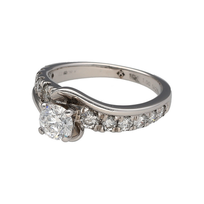 Make a statement with this pre-owned 18ct white gold diamond twist solitaire ring, featuring an impressive total diamond weight and a beautifully flowing design. Combining a sparkling central diamond with diamond-set shoulders, this luxurious ring offers exceptional brilliance and timeless elegance.

Design: The ring showcases a stunning twist-style setting that gracefully wraps around the central solitaire diamond, creating a sophisticated and contemporary look.