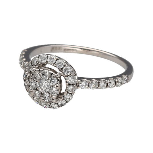 Add exceptional sparkle and timeless elegance to your jewellery collection with this pre-owned 18ct white gold diamond halo cluster ring. Featuring a dazzling cluster of diamonds surrounded by a sparkling halo and complemented by diamond-set shoulders, this beautiful ring offers impressive brilliance from every angle.

Design: The ring showcases a central diamond cluster framed by a sparkling halo of diamonds, creating a larger and more eye-catching appearance.