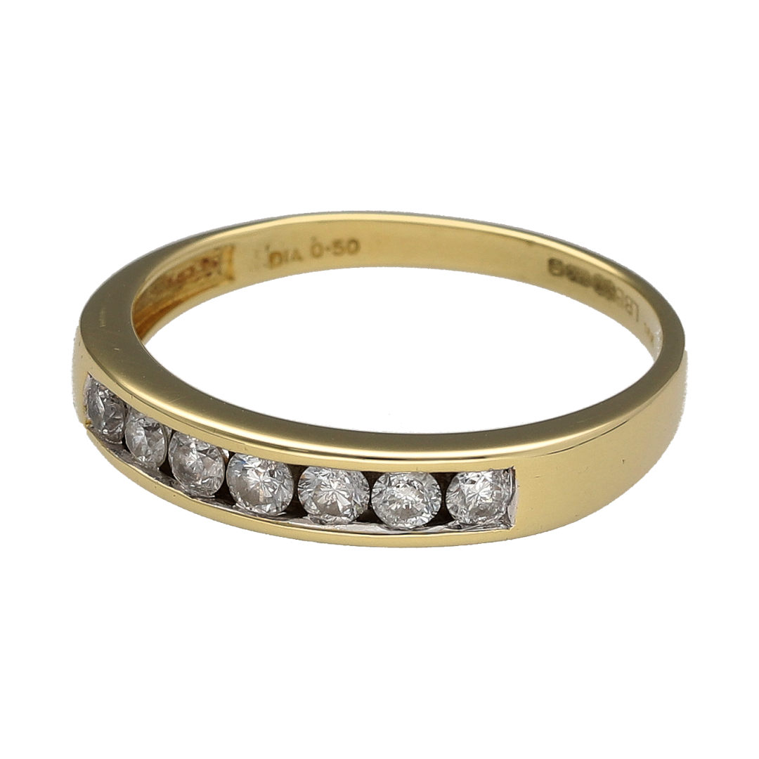 Celebrate timeless elegance and enduring style with this pre-owned 18ct yellow gold diamond seven stone band ring. Featuring seven sparkling diamonds across the front of the band, this classic design offers exceptional brilliance and is a popular choice for anniversaries, milestones, or everyday luxury.

Design: The ring showcases seven diamonds arranged across the 4mm wide front of the band, creating a balanced and elegant display of sparkle.