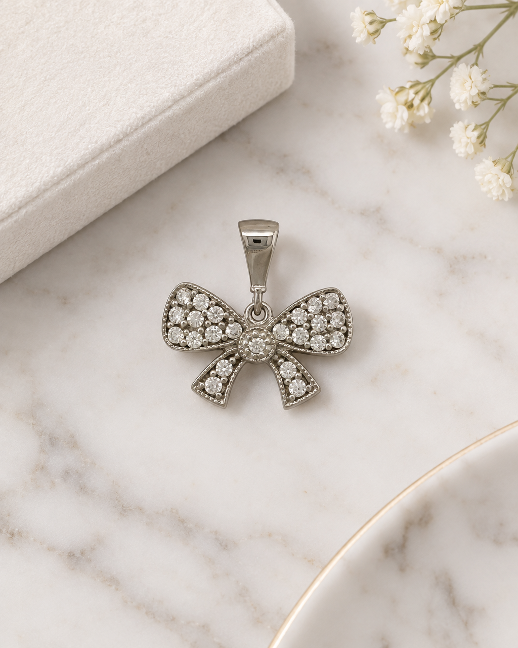 9ct White Gold & Cubic Zirconia Bow Pendant