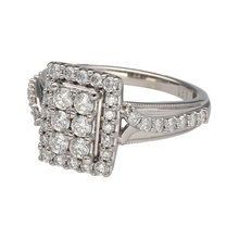 Load image into Gallery viewer, Bring brilliance and sophistication to your collection with this pre-owned 9ct white gold rectangular halo cluster ring, set with sparkling diamonds for a bold and timeless look.

Design: The ring showcases a rectangular diamond cluster framed by a halo of diamonds, further enhanced with diamond-set shoulders for added sparkle.
Material: Made in 9-carat white gold, the polished finish provides a bright backdrop that enhances the diamonds’ radiance.
