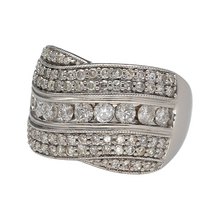 Load image into Gallery viewer, Bring dazzling elegance to your collection with this pre-owned 18ct white gold wide crossover band ring, adorned with brilliant-cut diamonds for a luxurious and contemporary statement.

Design: The ring features a bold 15mm wide crossover band, intricately set with multiple brilliant-cut diamonds that catch the light beautifully.
Material: Made in 18-carat white gold, the polished finish enhances the brilliance of the diamonds and lends a sleek, modern feel.
