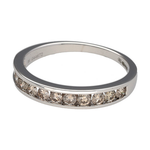 Add refined brilliance and modern elegance to your collection with this pre-owned 9ct white gold diamond set band ring—perfect for timeless sparkle with a contemporary edge.

Design: The front of the band measures approximately 3.5mm wide and features a row of channel-set diamonds, offering a clean and sophisticated look.
Material: Made from 9-carat white gold, the sleek polished finish enhances the brilliance of the diamonds with a bright, modern glow.
