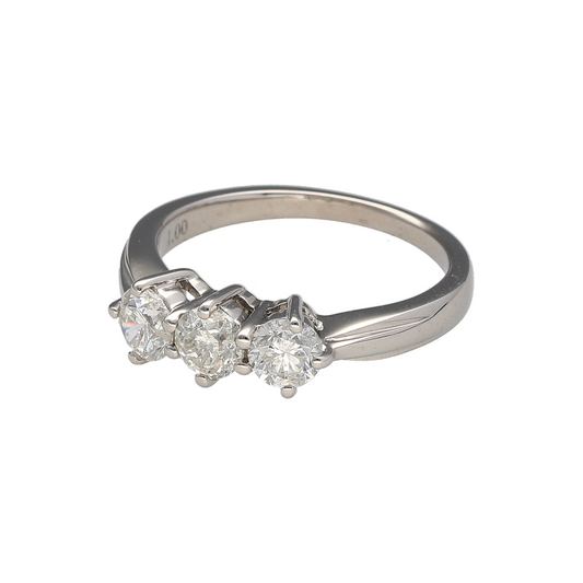 Add timeless brilliance and sophistication to your collection with this pre-owned 18ct white gold diamond trilogy ring, symbolising past, present, and future—perfect for special occasions or enduring everyday elegance.

Design: The ring features a classic three-stone arrangement with approximately 1.00ct of total diamond content, each stone offering beautiful sparkle and presence. The diamonds display an approximate clarity of I1, adding character and natural charm to the piece.