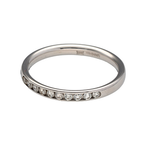 New 18ct White Gold & Diamond Set Band Ring in size L with the weight 2.20 grams. The band is 2mm wide and contains ten channel set Diamonds which are approximately 20pt of Diamond content in total