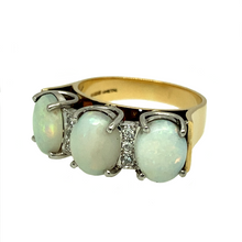 Load image into Gallery viewer, Preowned 18ct Yellow and White Gold Diamond &amp; Opal Ring in size N with the weight 7.50 grams. This ring is made up of three 9mm by 7mm opal stones with two brilliant cut Diamonds set in between
