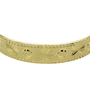 New 9ct Solid Gold Patterned Children's Bangle with the weight 15.10 grams and the diameter of 5.6cm. The width of the bangle is 9mm high