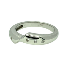 Load image into Gallery viewer, Preowned 18ct White Gold &amp; Diamond Set Off Set Band Ring in size O with the weight 4.90 grams. The widest part of the band is approximately 4mm high
