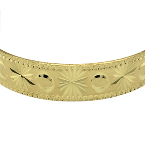 New 9ct Solid Gold Patterned Baby Bangle with the weight 12.20 grams and the diameter of 4.6cm. The width of the bangle is 9mm high