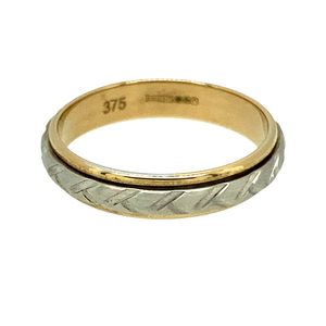New 9ct Yellow and White Gold 4mm Patterned Band Ring in size N with the weight 2.40 grams. The white Gold band moves independently from the yellow Gold in a spinning movement 