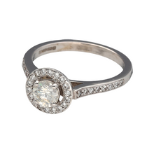 Load image into Gallery viewer, New 18ct White Gold &amp; Diamond Set Halo Ring in size N with the weight 4.40 grams. There is approximately 86pt Diamonds set in the ring which are approximate clarity Si2 and colour G - H
