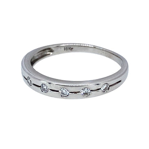 Preowned 18ct White Gold & Diamond Set Band Ring in size L with the weight 2.20 grams. The band is 3mm wide at the front